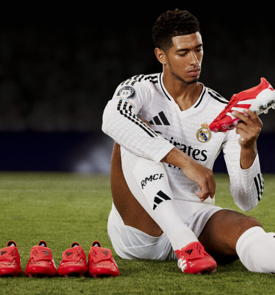 Jude Bellingham poses with adidas Predator 25